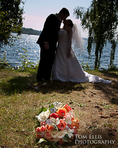 Bride and groom on the beach at Chism Beach Park