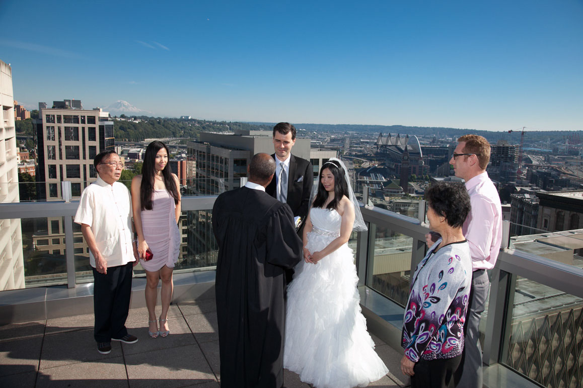 Seattle municipal courthouse rooftop wedding, with scenic view of Seattle and Mt Rainier